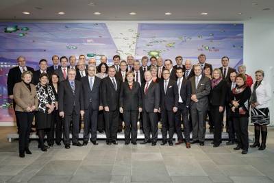 Arbeitnehmergruppe mit der Bundeskanzlerin